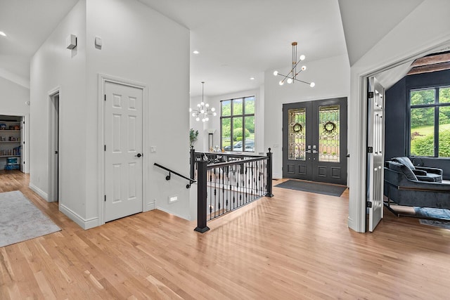 621 S Woodhaven Rd, Nixa, MO 65714 - entryway featuring a chandelier, healthy amount of natural light, light wood-style flooring, recessed lighting, and lofted ceiling