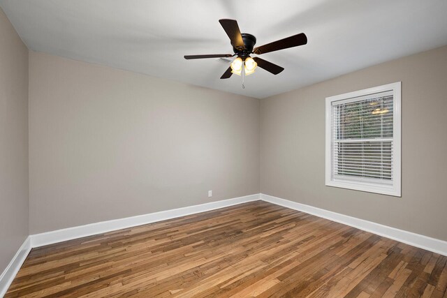 621 S Woodhaven Rd, Nixa, MO 65714 - unfurnished room with wood-type flooring and ceiling fan