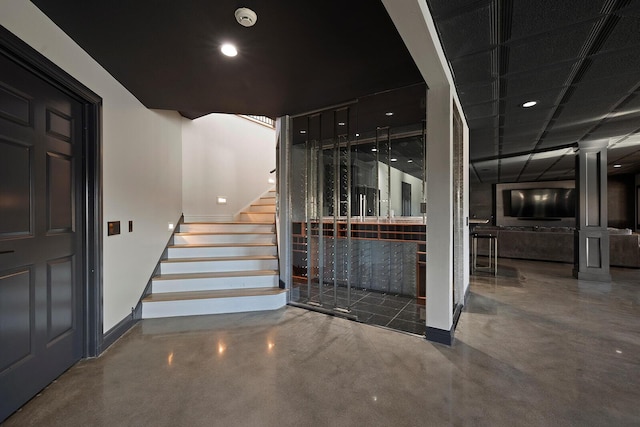 621 S Woodhaven Rd, Nixa, MO 65714 - staircase featuring finished concrete flooring