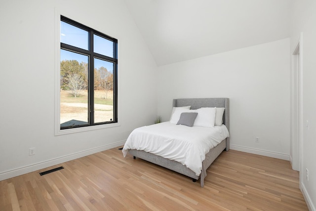 621 S Woodhaven Rd, Nixa, MO 65714 - bedroom with light wood finished floors and vaulted ceiling