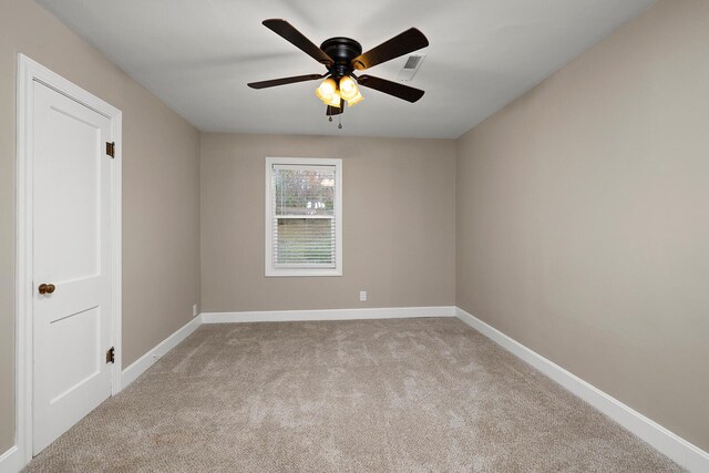 621 S Woodhaven Rd, Nixa, MO 65714 - empty room featuring light carpet and a ceiling fan