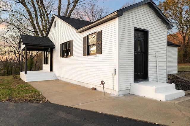 621 S Woodhaven Rd, Nixa, MO 65714 - view of outdoor structure at dusk