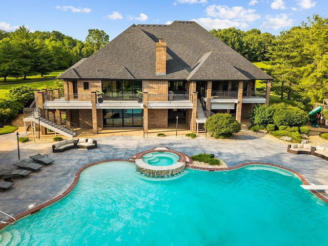 621 S Woodhaven Rd, Nixa, MO 65714 - view of swimming pool featuring stairs, a patio, and an outdoor living space