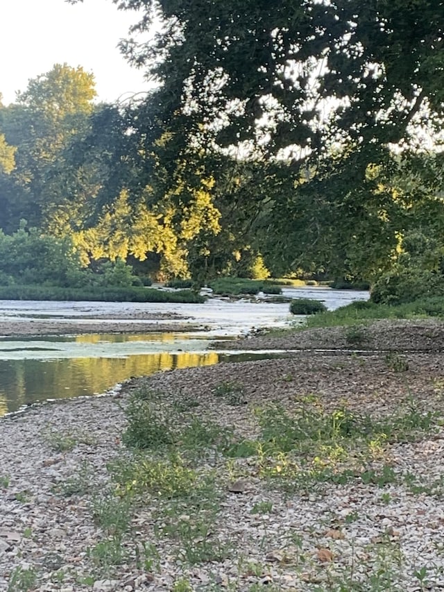 621 S Woodhaven Rd, Nixa, MO 65714 - view of yard featuring a water view and a forest view
