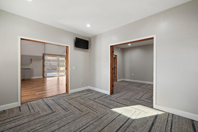 621 S Woodhaven Rd, Nixa, MO 65714 - carpeted spare room featuring recessed lighting and wood finished floors