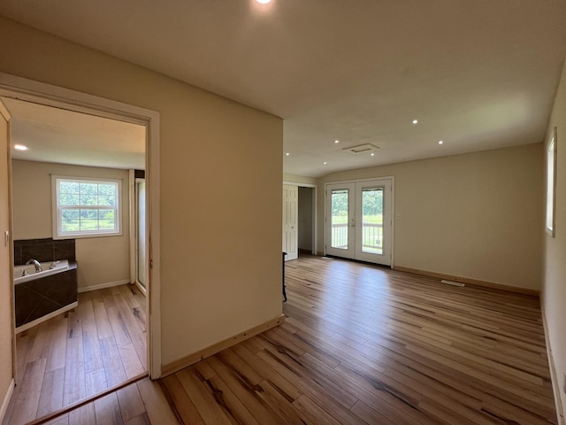 2191 County Road 2790, Mountain View, MO 65548 - spare room featuring healthy amount of natural light, hardwood / wood-style floors, and recessed lighting