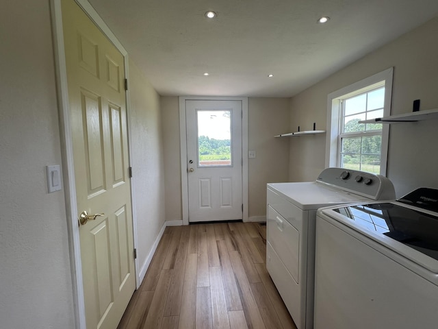 2191 County Road 2790, Mountain View, MO 65548 - laundry room featuring washer and clothes dryer, light wood-style floors, healthy amount of natural light, and recessed lighting