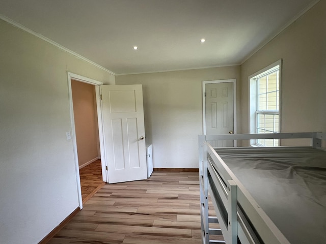 2191 County Road 2790, Mountain View, MO 65548 - unfurnished bedroom with light wood-style flooring, crown molding, and recessed lighting