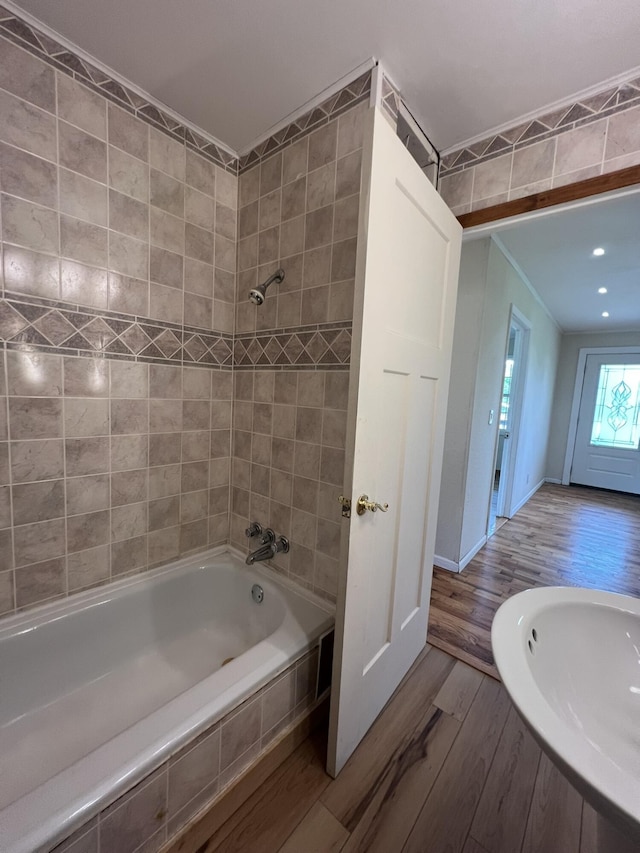 2191 County Road 2790, Mountain View, MO 65548 - bathroom featuring wood finished floors, crown molding, and tiled shower / bath combo
