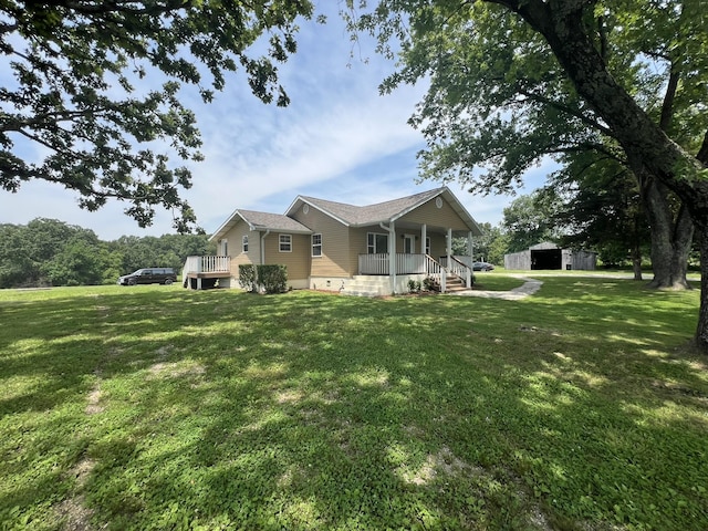 2191 County Road 2790, Mountain View, MO 65548 - view of side of property with covered porch, a lawn, and an outdoor structure