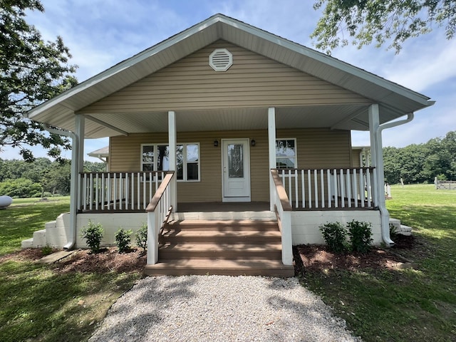 2191 County Road 2790, Mountain View, MO 65548 - view of front of house featuring a porch and a front yard