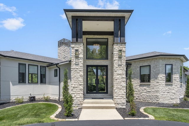 5817 E Summit View Dr, Springfield, MO 65809 - doorway to property with stone siding and a shingled roof