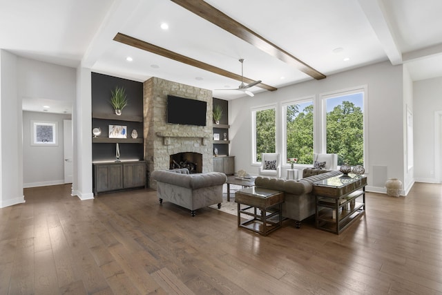 5817 E Summit View Dr, Springfield, MO 65809 - living room featuring beam ceiling, wood-type flooring, a fireplace, recessed lighting, and built in shelves