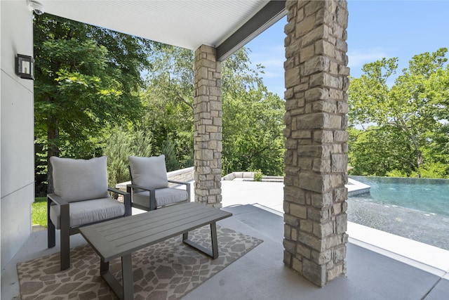 5817 E Summit View Dr, Springfield, MO 65809 - view of patio / terrace with a pool and view of scattered trees