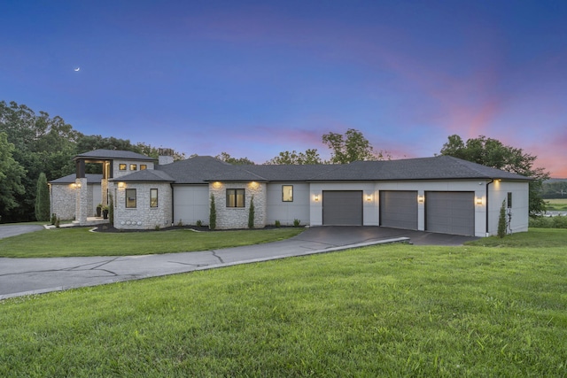 5817 E Summit View Dr, Springfield, MO 65809 - prairie-style home featuring driveway, a garage, and a yard