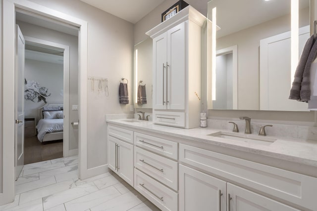 5817 E Summit View Dr, Springfield, MO 65809 - ensuite bathroom with double vanity and marble look tiles