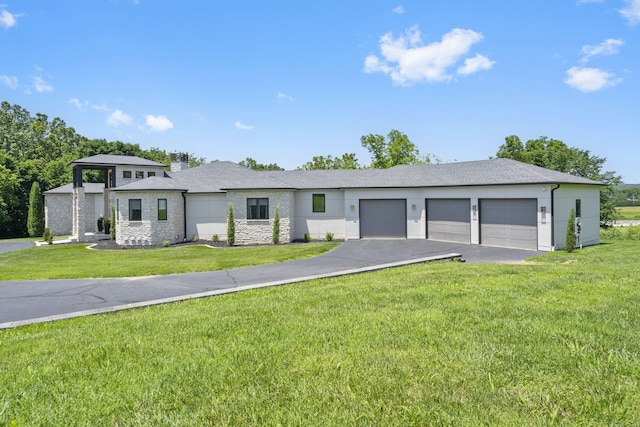 5817 E Summit View Dr, Springfield, MO 65809 - view of front facade with a garage, asphalt driveway, stone siding, a front yard, and a chimney