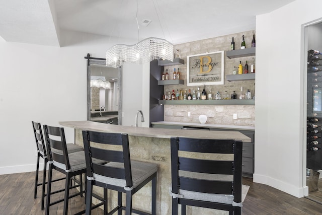 5817 E Summit View Dr, Springfield, MO 65809 - indoor wet bar with dark wood-style floors