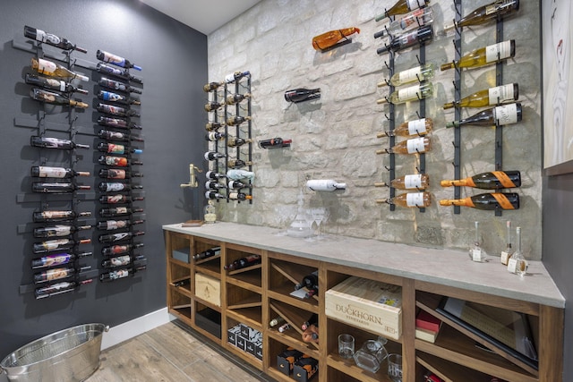 5817 E Summit View Dr, Springfield, MO 65809 - wine room with wood finished floors and baseboards