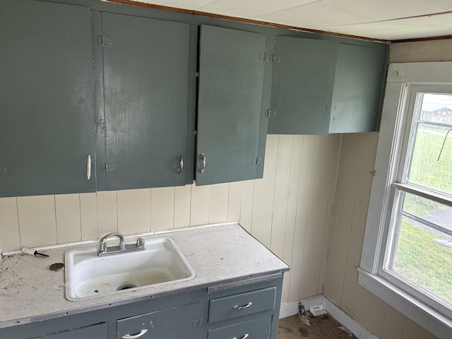 201 W Pennington Ave, Ava, MO 65608 - kitchen with gray cabinetry and light countertops