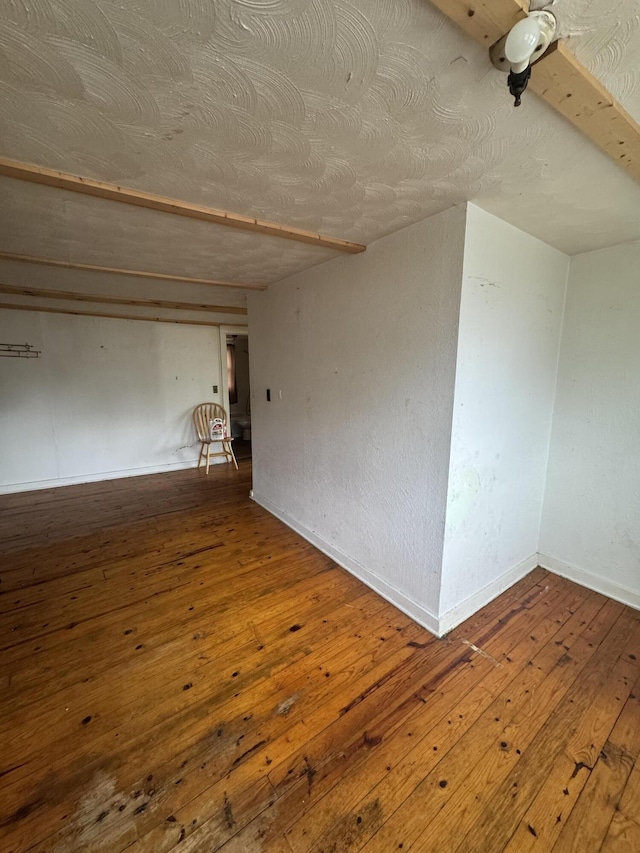 201 W Pennington Ave, Ava, MO 65608 - spare room with wood-type flooring and baseboards