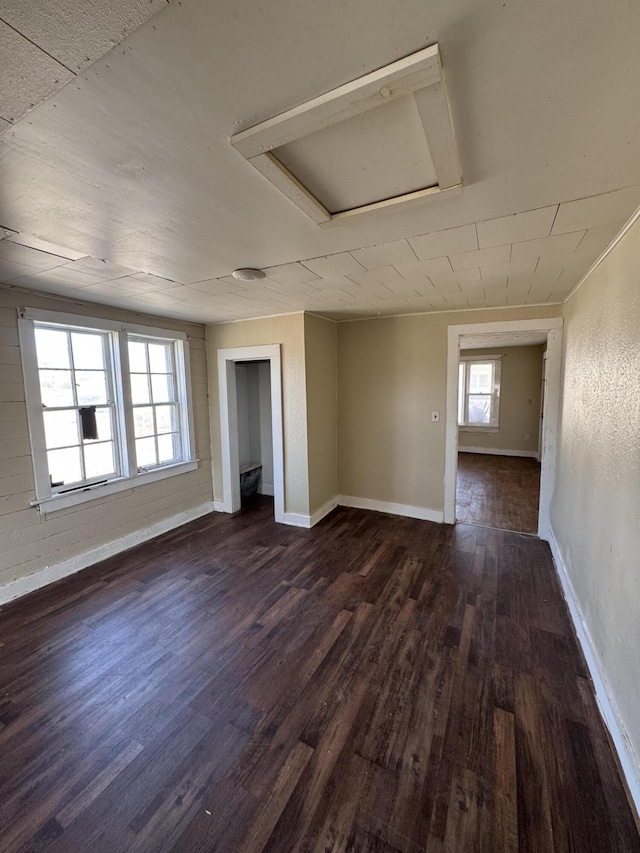 201 W Pennington Ave, Ava, MO 65608 - empty room with attic access and dark wood-style floors