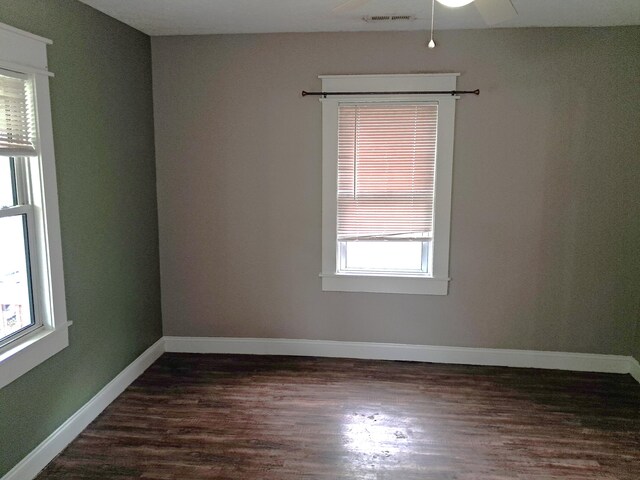 2412 W Olive St, Springfield, MO 65802 - spare room with dark wood-style floors and ceiling fan