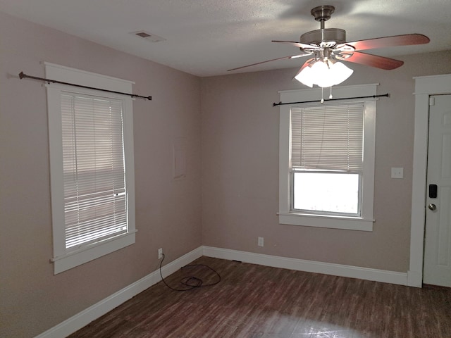 2412 W Olive St, Springfield, MO 65802 - unfurnished room with wood finished floors and a ceiling fan