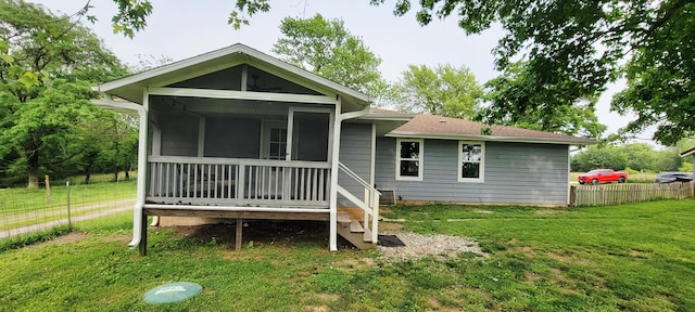 524 Niangua Rd, Niangua, MO 65713 - back of property featuring a sunroom