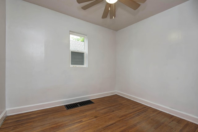 1612 N Grant Ave, Springfield, MO 65803 - empty room with a ceiling fan and dark wood-style floors