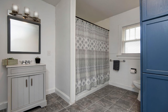 1612 N Grant Ave, Springfield, MO 65803 - full bathroom featuring vanity, a shower with shower curtain, and tile patterned flooring