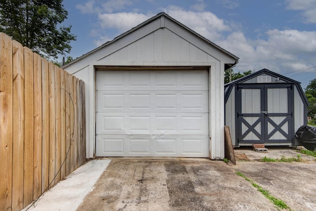 1612 N Grant Ave, Springfield, MO 65803 - detached garage featuring a shed and concrete driveway