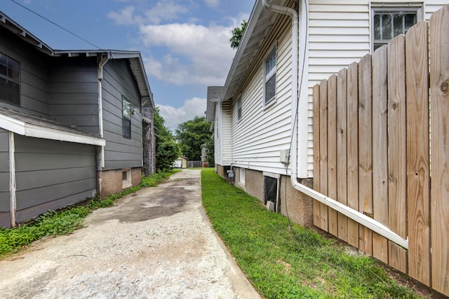 1612 N Grant Ave, Springfield, MO 65803 - view of side of home featuring driveway