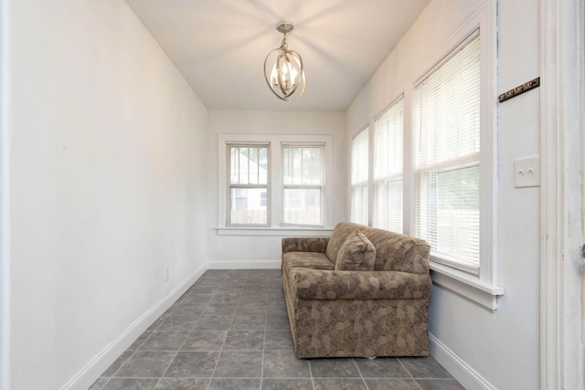1612 N Grant Ave, Springfield, MO 65803 - living area with baseboards and a chandelier
