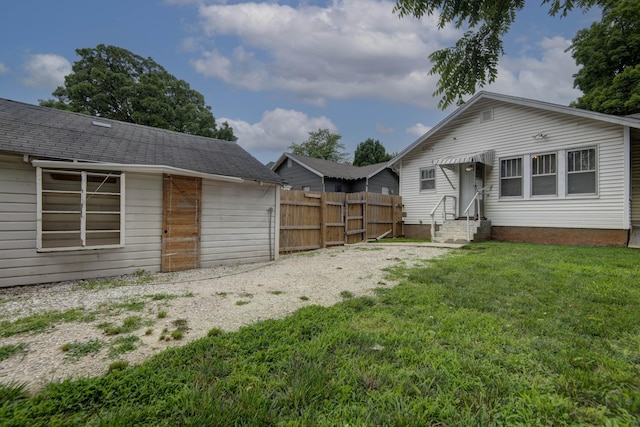 1612 N Grant Ave, Springfield, MO 65803 - rear view of house featuring entry steps