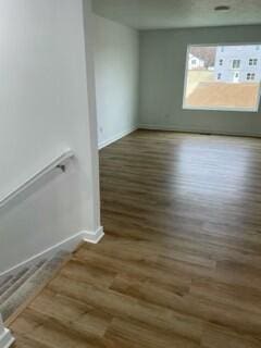 608 N Cheyenne Valley Rd, Nixa, MO 65714 - empty room featuring wood finished floors