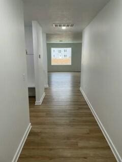 608 N Cheyenne Valley Rd, Nixa, MO 65714 - corridor with baseboards and wood finished floors