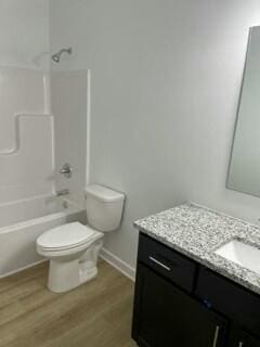 608 N Cheyenne Valley Rd, Nixa, MO 65714 - bathroom featuring vanity, wood finished floors, and shower / tub combination