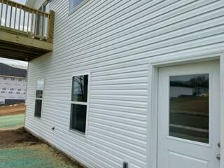 608 N Cheyenne Valley Rd, Nixa, MO 65714 - view of home's exterior featuring a balcony