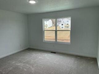 608 N Cheyenne Valley Rd, Nixa, MO 65714 - empty room featuring baseboards and carpet floors