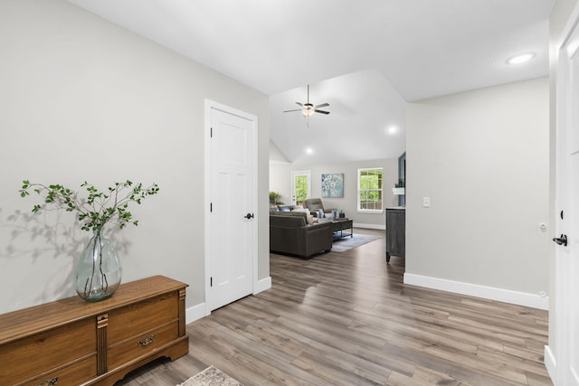 427 N Maynard Rd, Nixa, MO 65714 - corridor with light wood finished floors, lofted ceiling, and recessed lighting