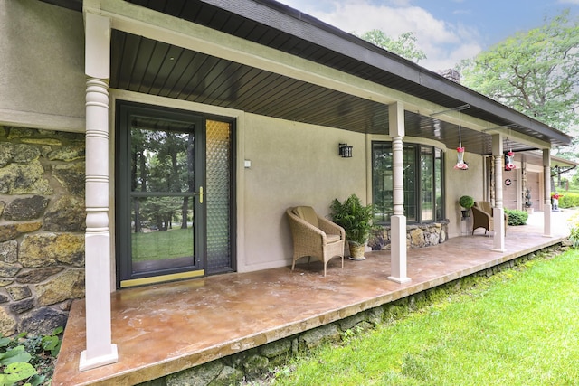 2620 Big Timber Rd, Marshfield, MO 65706 - entrance to property with stucco siding, covered porch, and stone siding