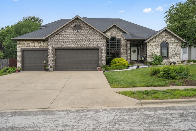 903 E Elizabeth St, Republic, MO 65738 - french country home featuring an attached garage, driveway, brick siding, stone siding, and roof with shingles