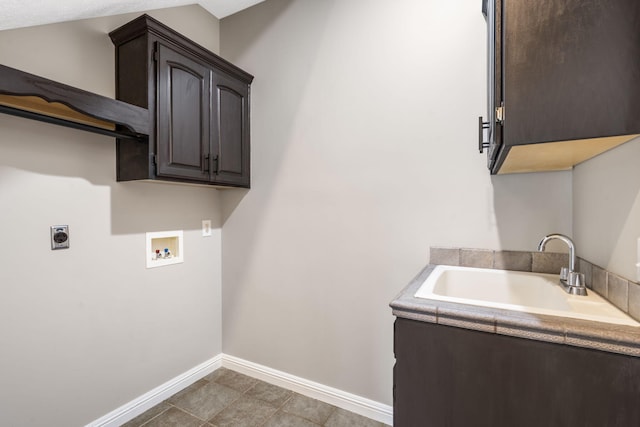 903 E Elizabeth St, Republic, MO 65738 - laundry room featuring electric dryer hookup, hookup for a washing machine, and cabinet space