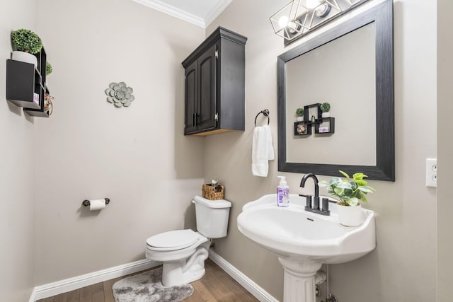 903 E Elizabeth St, Republic, MO 65738 - half bathroom featuring crown molding and wood finished floors