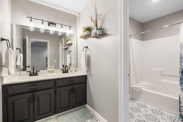 903 E Elizabeth St, Republic, MO 65738 - bathroom featuring double vanity, shower / bathtub combination with curtain, and tile patterned floors