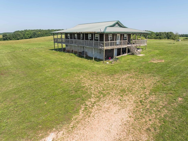15608 Lawrence Unit 2007, Miller, MO 65707 - view of front of house featuring a front yard and a deck