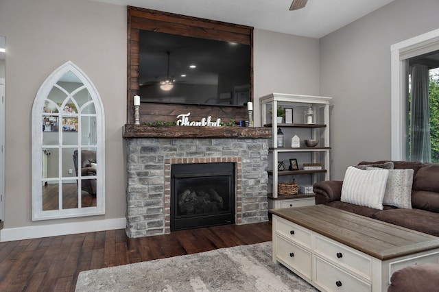 926 E Downshire Dr, Nixa, MO 65714 - living room featuring ceiling fan, wood finished floors, and a fireplace