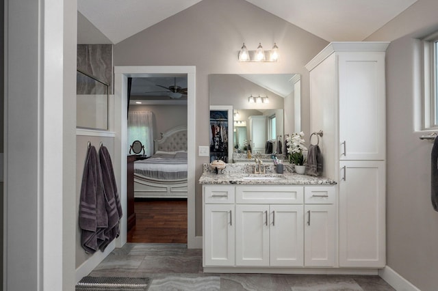 926 E Downshire Dr, Nixa, MO 65714 - ensuite bathroom featuring vanity, vaulted ceiling, a ceiling fan, and a shower