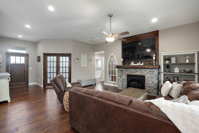 926 E Downshire Dr, Nixa, MO 65714 - living area featuring dark wood-type flooring, recessed lighting, a ceiling fan, a large fireplace, and french doors